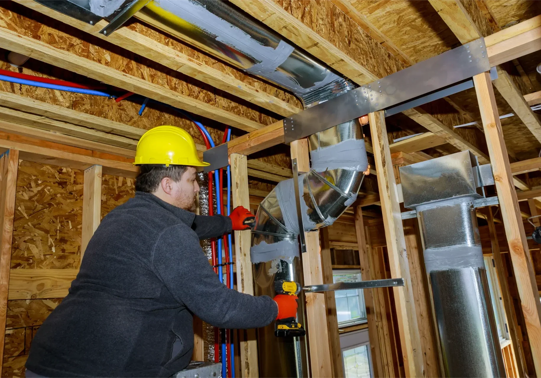 HVAC contractor servicing air duct repair